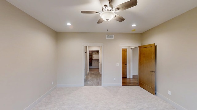 2329 9th St W, Albert Lea, MN 56007 - unfurnished bedroom featuring light carpet, recessed lighting, and a ceiling fan