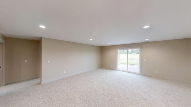 2329 9th St W, Albert Lea, MN 56007 - spare room with recessed lighting and light colored carpet