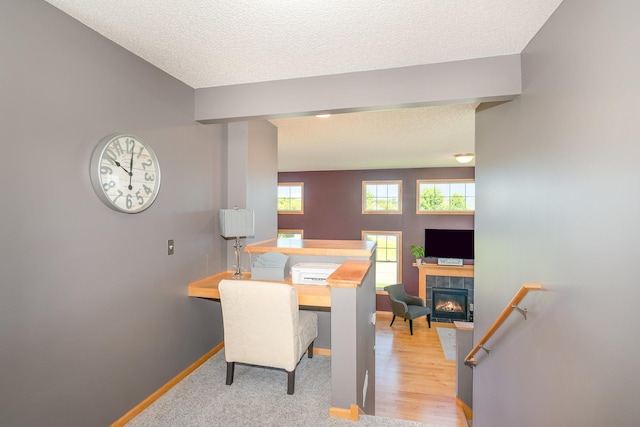 9742 Saint Andrews Dr, Elko New Market, MN 55020 - dining area with a tiled fireplace and a textured ceiling