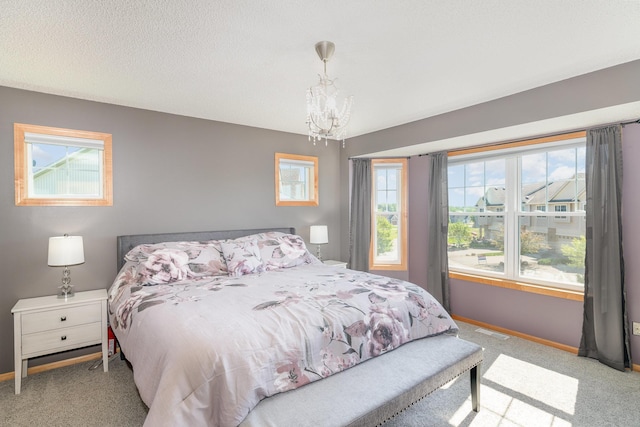 9742 Saint Andrews Dr, Elko New Market, MN 55020 - bedroom with a chandelier and carpet flooring