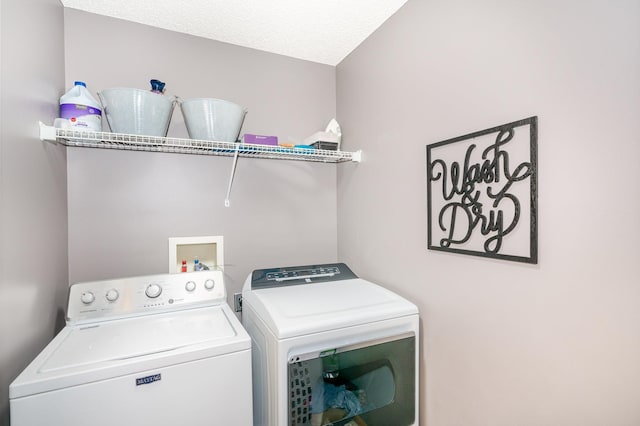 9742 Saint Andrews Dr, Elko New Market, MN 55020 - laundry area with washer and clothes dryer