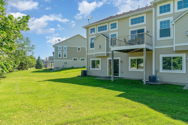 9742 Saint Andrews Dr, Elko New Market, MN 55020 - rear view of property featuring a lawn and a balcony