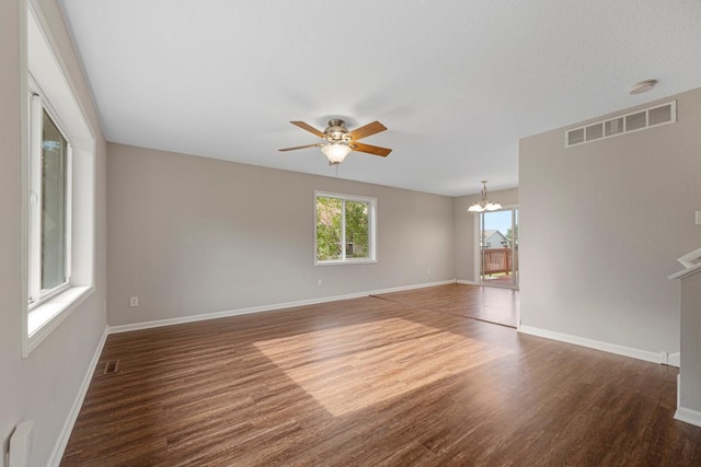 2112 York St, Saint Peter, MN 56082 - empty room with a chandelier, wood finished floors, and ceiling fan