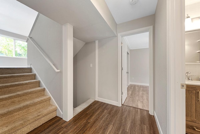 2112 York St, Saint Peter, MN 56082 - staircase featuring wood finished floors and baseboards