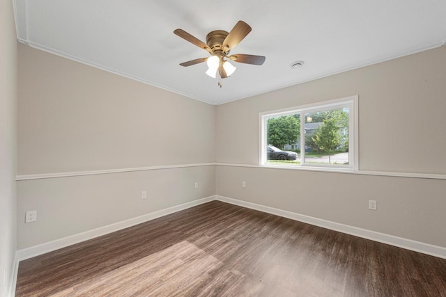 2112 York St, Saint Peter, MN 56082 - empty room with wood finished floors, a ceiling fan, and crown molding