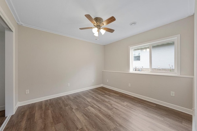 2112 York St, Saint Peter, MN 56082 - unfurnished room featuring wood finished floors, ceiling fan, and ornamental molding