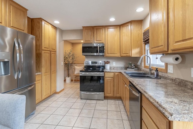 385 Lexington Ave, Le Center, MN 56057 - kitchen with appliances with stainless steel finishes, light tile patterned floors, and recessed lighting