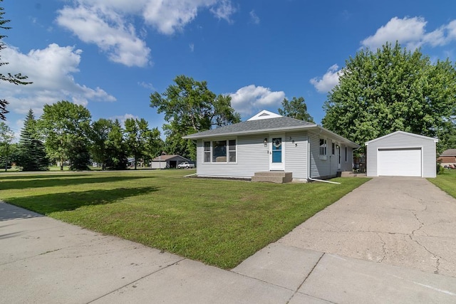 385 Lexington Ave, Le Center, MN 56057 - bungalow-style house with an outdoor structure, a front yard, a detached garage, and driveway