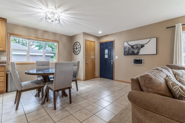 385 Lexington Ave, Le Center, MN 56057 - dining space featuring light tile patterned floors and recessed lighting