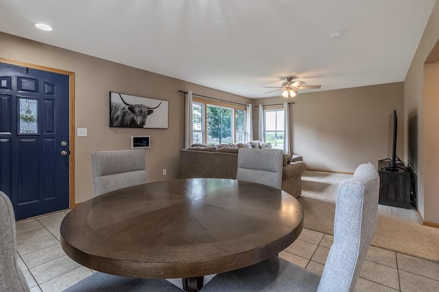 385 Lexington Ave, Le Center, MN 56057 - dining space with light tile patterned floors and ceiling fan