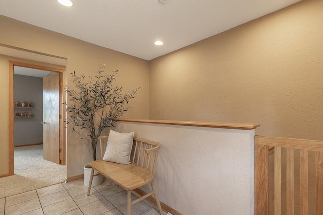385 Lexington Ave, Le Center, MN 56057 - sitting room with light tile patterned floors, recessed lighting, and light carpet