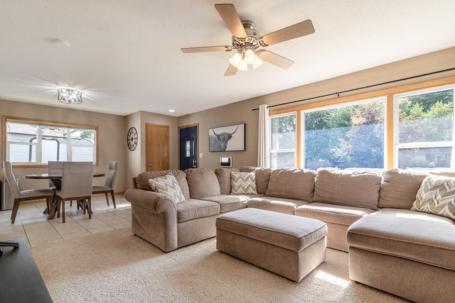 385 Lexington Ave, Le Center, MN 56057 - living area with ceiling fan, light tile patterned floors, recessed lighting, and light carpet
