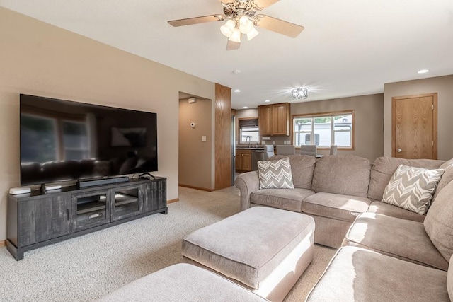 385 Lexington Ave, Le Center, MN 56057 - living area featuring light colored carpet, ceiling fan, and recessed lighting