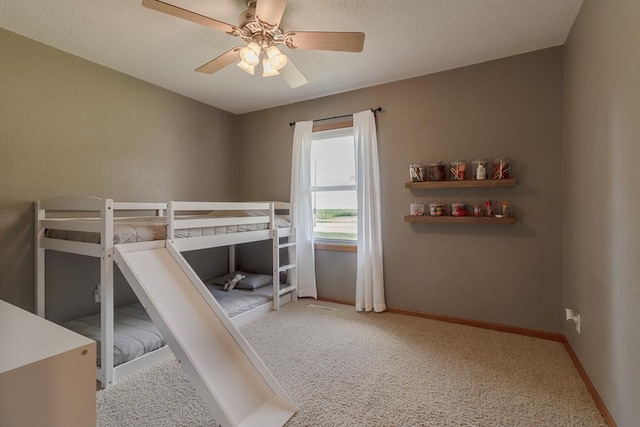 385 Lexington Ave, Le Center, MN 56057 - bedroom featuring carpet flooring and a ceiling fan