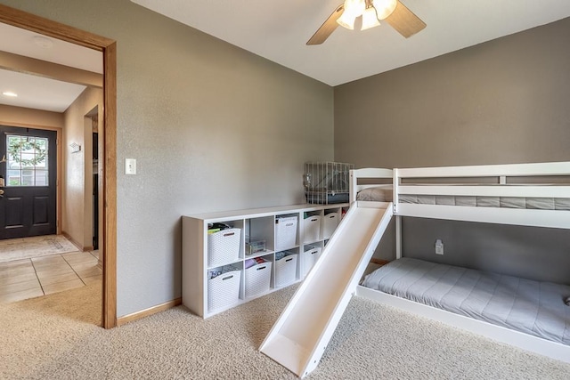 385 Lexington Ave, Le Center, MN 56057 - unfurnished bedroom with carpet floors and ceiling fan