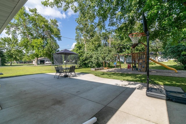 385 Lexington Ave, Le Center, MN 56057 - view of patio / terrace featuring a playground and outdoor dining space