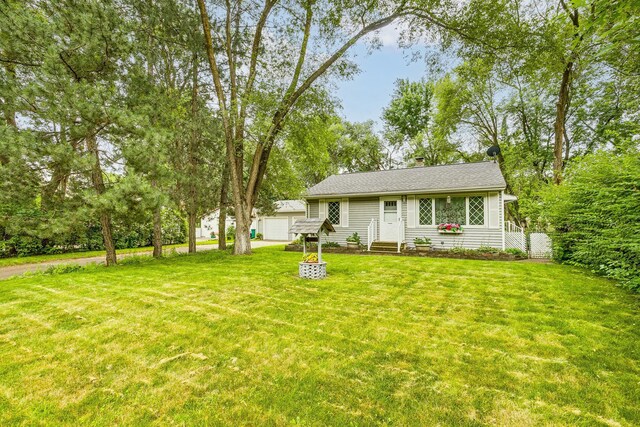 536 County Road J W, Shoreview, MN 55126 - view of front of home with entry steps, a front yard, a chimney, and a garage