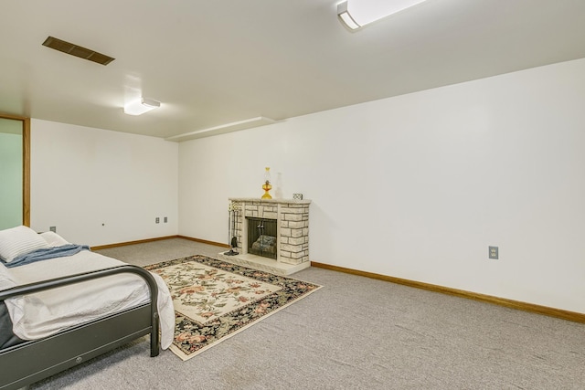 536 County Road J W, Shoreview, MN 55126 - bedroom featuring carpet and a stone fireplace