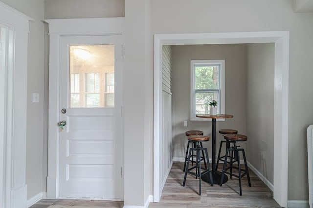 2156 Saint Anthony Ave, Saint Paul, MN 55104 - entryway featuring wood finished floors and baseboards