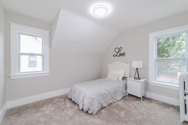 2156 Saint Anthony Ave, Saint Paul, MN 55104 - bedroom featuring light carpet and vaulted ceiling