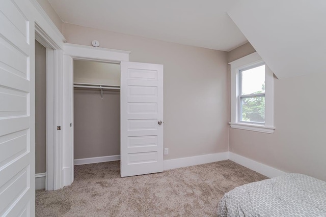 2156 Saint Anthony Ave, Saint Paul, MN 55104 - unfurnished bedroom with carpet floors and a closet
