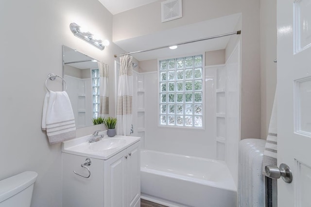2156 Saint Anthony Ave, Saint Paul, MN 55104 - bathroom with radiator heating unit, vanity, and shower / bath combo