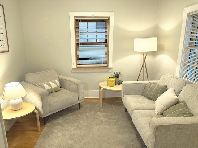 1699 Malvern St, Lauderdale, MN 55113 - living area featuring baseboards and wood finished floors