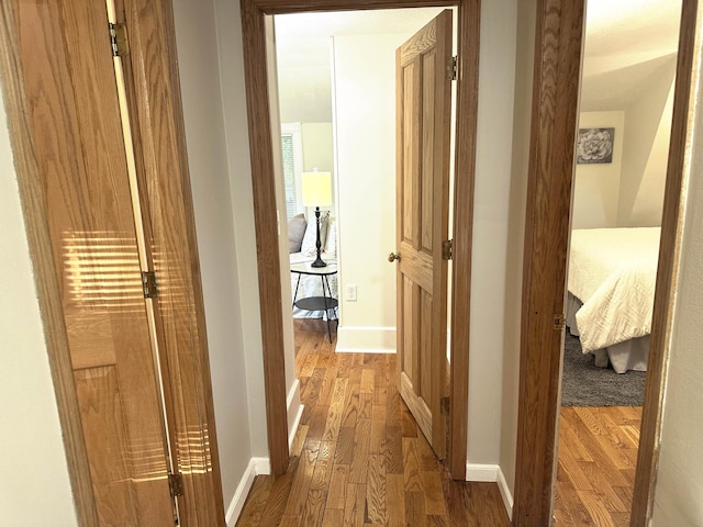 1699 Malvern St, Lauderdale, MN 55113 - hallway featuring wood finished floors and baseboards