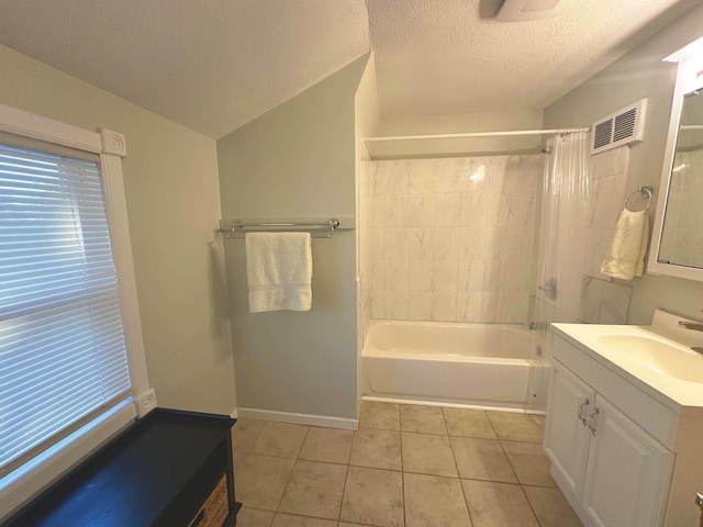 1699 Malvern St, Lauderdale, MN 55113 - bathroom featuring tile patterned flooring, vanity, shower / tub combo with curtain, and a textured ceiling