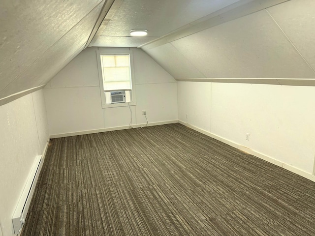 1699 Malvern St, Lauderdale, MN 55113 - additional living space featuring a baseboard radiator, carpet floors, vaulted ceiling, and cooling unit