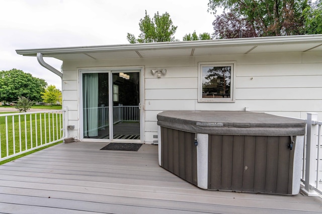 516 Gustavus Ave, Fergus Falls, MN 56537 - wooden terrace with a hot tub and a yard