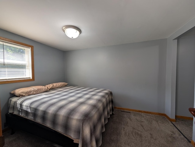 202 Hill St, Russell, MN 56169 - carpeted bedroom featuring baseboards