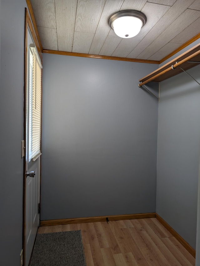 202 Hill St, Russell, MN 56169 - walk in closet featuring wood finished floors