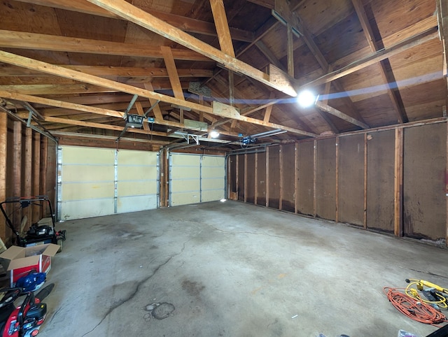 202 Hill St, Russell, MN 56169 - garage featuring a garage door opener
