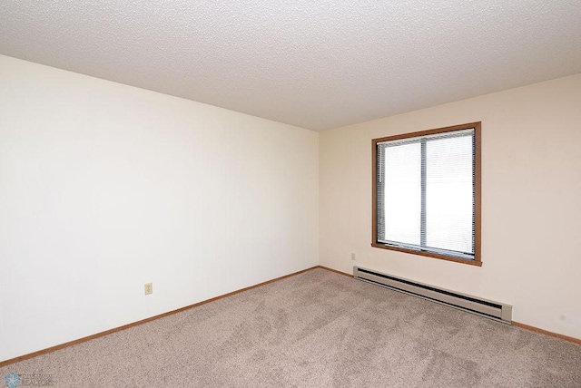 3209 15th Ave S Unit B, Fargo, ND 58103 - empty room with baseboard heating and carpet flooring