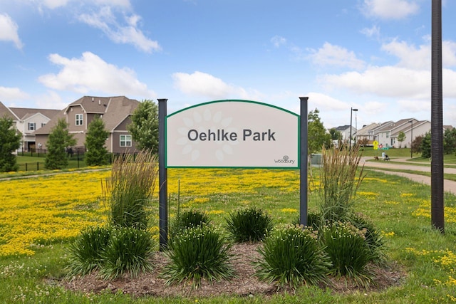 8800 Granite Pass, Woodbury, MN 55129 - community / neighborhood sign featuring a residential view and a lawn