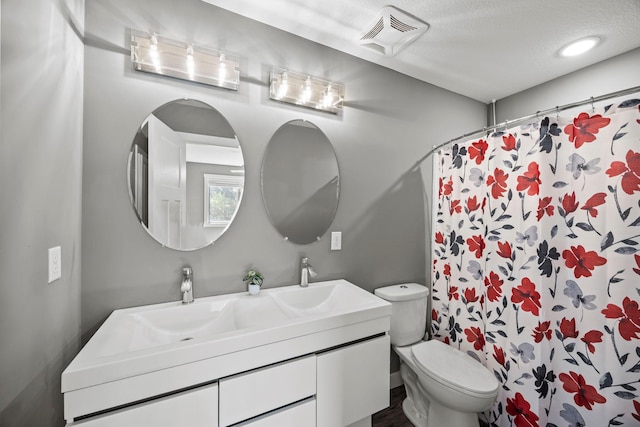 13143 Jefferson St, Becker, MN 55308 - full bathroom featuring double vanity, curtained shower, and a textured ceiling