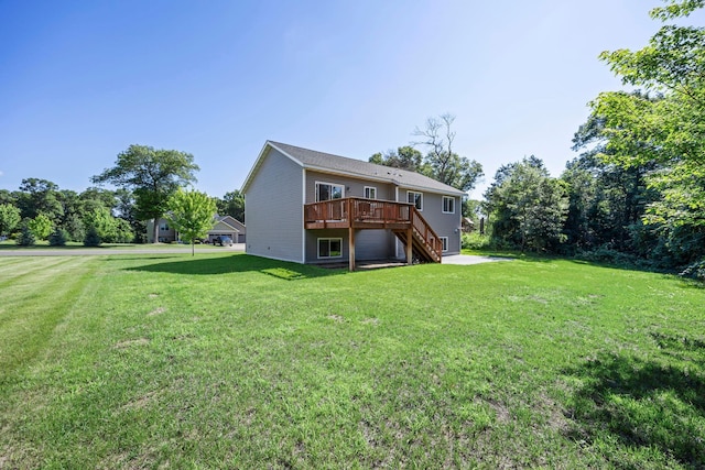 13143 Jefferson St, Becker, MN 55308 - rear view of property featuring a deck, stairs, and a lawn