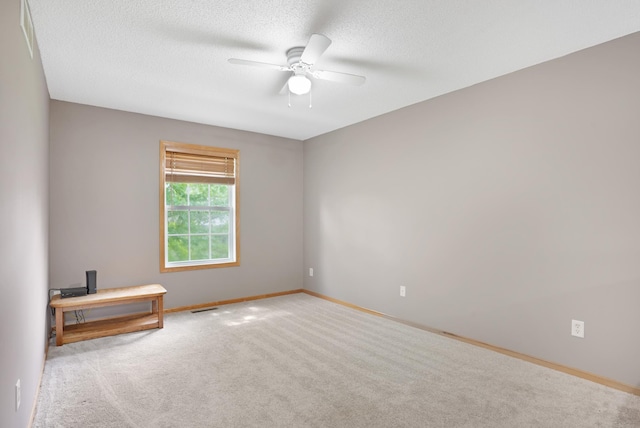14301 Banyan Ln, Rosemount, MN 55068 - carpeted empty room featuring ceiling fan and a textured ceiling