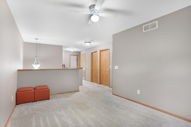 14301 Banyan Ln, Rosemount, MN 55068 - carpeted empty room with a ceiling fan and a textured ceiling
