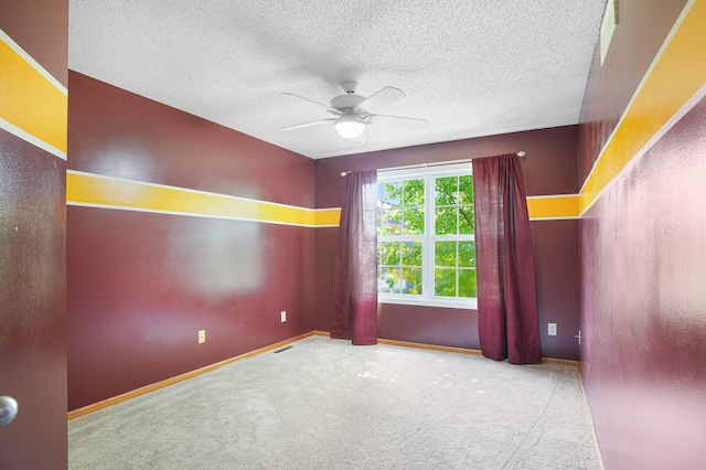 14301 Banyan Ln, Rosemount, MN 55068 - empty room featuring a ceiling fan, carpet floors, and a textured ceiling