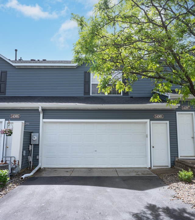 14301 Banyan Ln, Rosemount, MN 55068 - garage with asphalt driveway