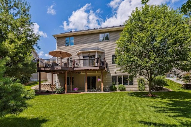 1254 129th Ln NW, Coon Rapids, MN 55448 - back of house with a deck and a yard