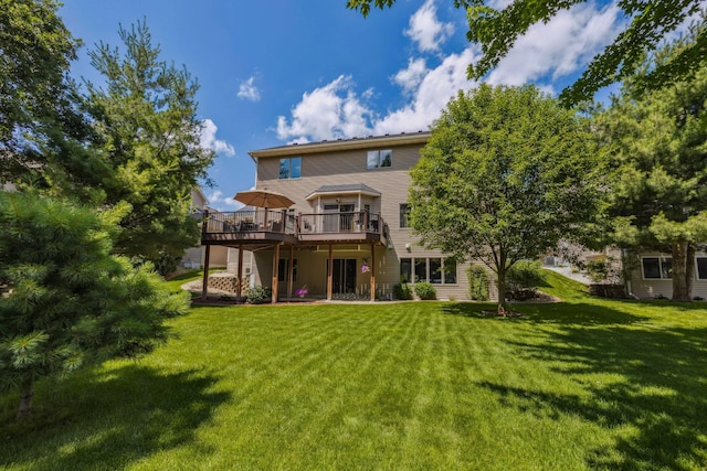 1254 129th Ln NW, Coon Rapids, MN 55448 - back of house with a deck and a lawn