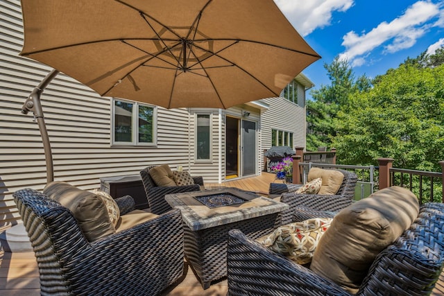 1254 129th Ln NW, Coon Rapids, MN 55448 - wooden terrace featuring an outdoor living space with a fire pit