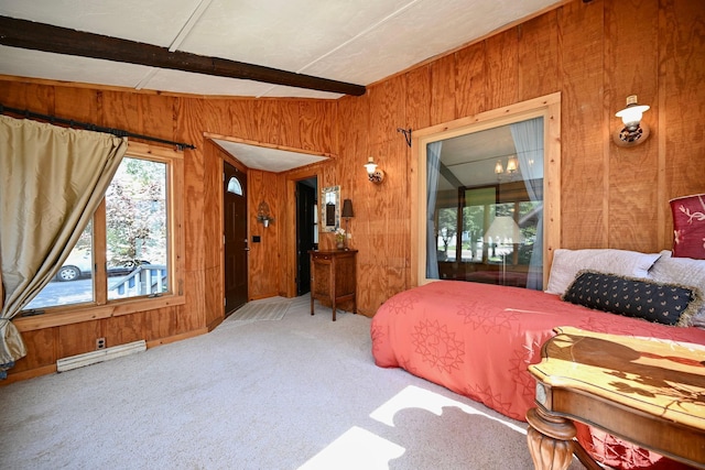 366 Kansas St, Winona, MN 55987 - bedroom with a baseboard radiator, wooden walls, carpet flooring, and beam ceiling