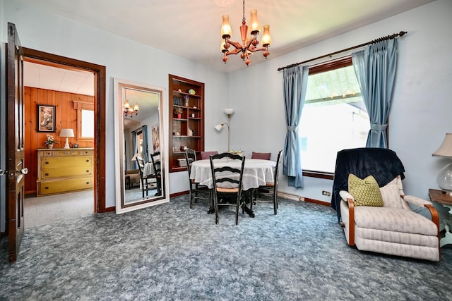 366 Kansas St, Winona, MN 55987 - carpeted dining area with a chandelier