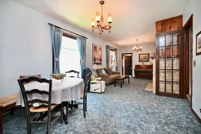 366 Kansas St, Winona, MN 55987 - dining room featuring a chandelier and carpet flooring