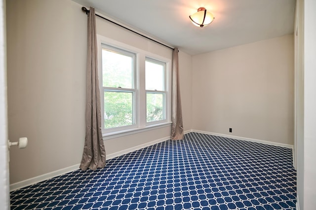 366 Kansas St, Winona, MN 55987 - carpeted empty room with baseboards