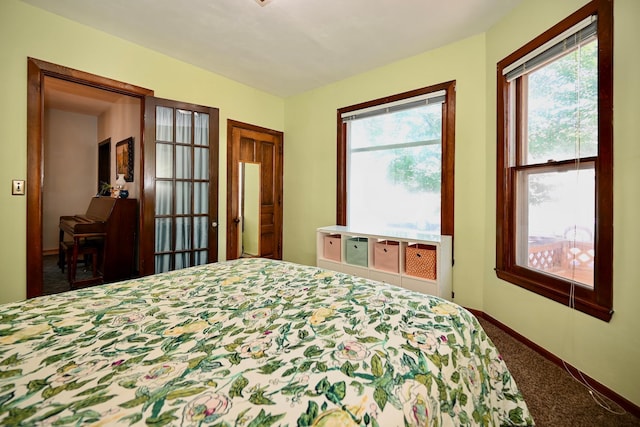 366 Kansas St, Winona, MN 55987 - carpeted bedroom featuring baseboards